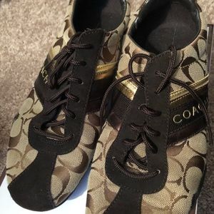 Brown and gold size 9 Coach sneakers